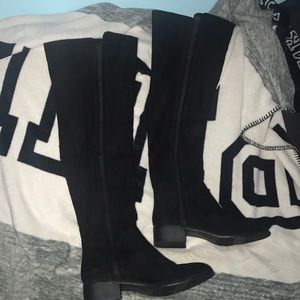 Thigh high black boots